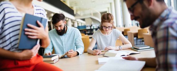 Group of college students studying